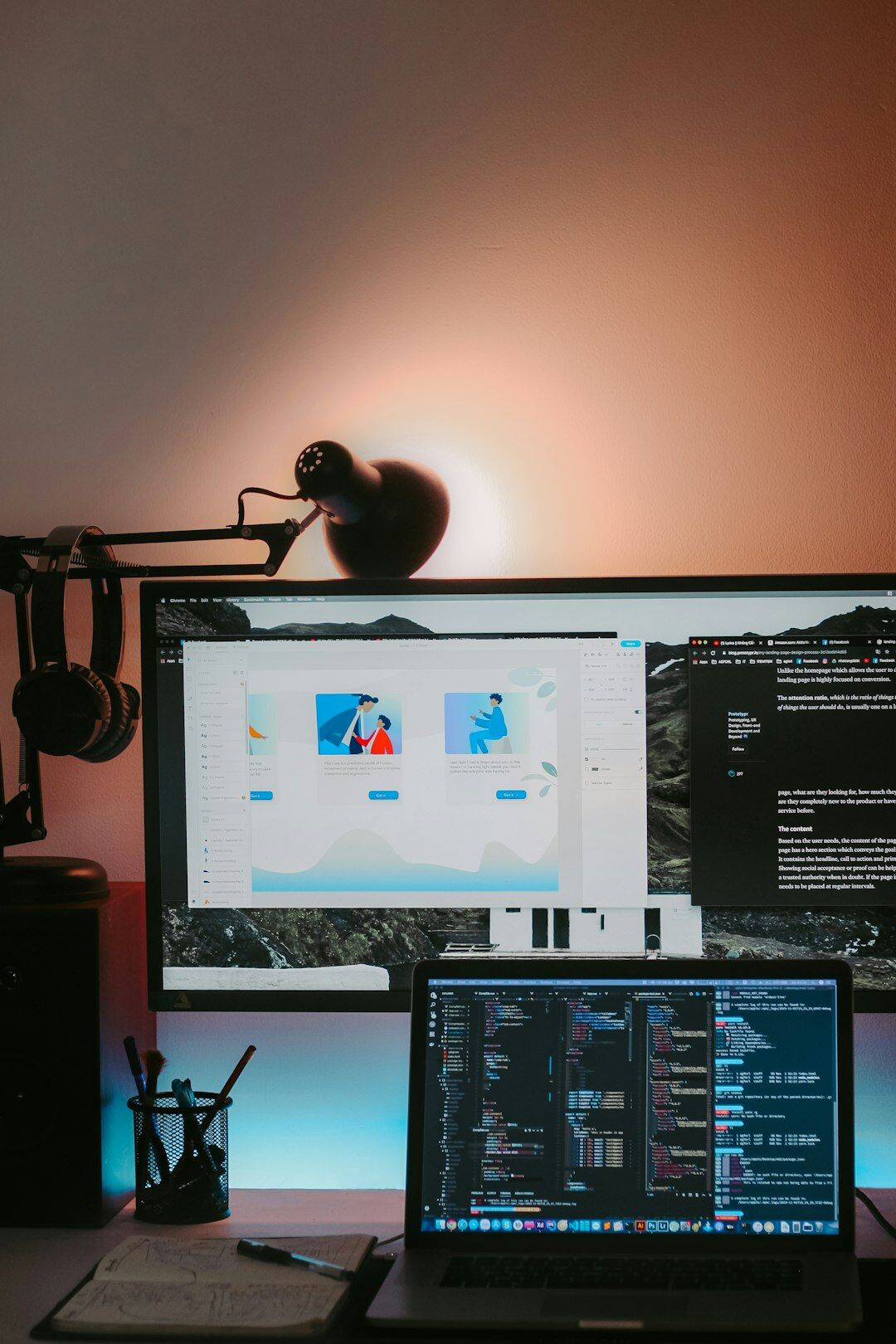 Video editor working at a desk with multiple monitors