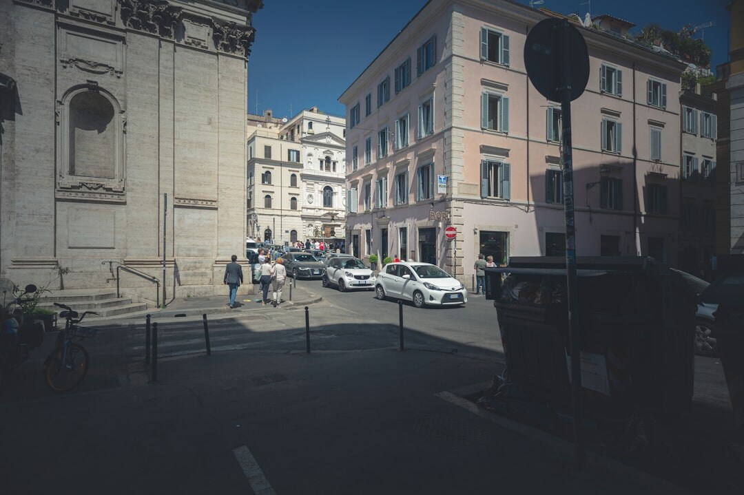 Reporter holding a camera in a European city street